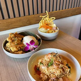 From front to back: Yum MaMa (ramen salad), Gai Tod (fried chicken), Khao Soi (curry egg noodles)