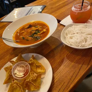 two plates of food and a drink