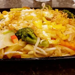 a bowl of noodles and vegetables