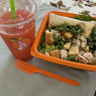 Chicken Caesar salad (hold the tomatoes) and a frozen strawberry lemonade.