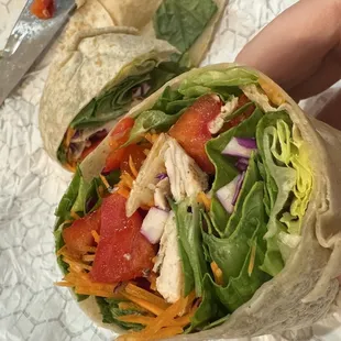 Thai (wrap), sauce comes on the side always (because it's peanut based).