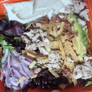 Cobb salad with cranberries and onion