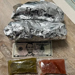 Huge breakfast burritos! A deal for $3.34 each! I liked both salsas.