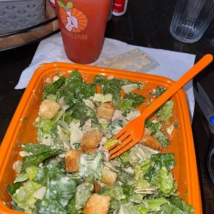 Chicken Caesar salad, strawberry lemonade that should have been frozen.