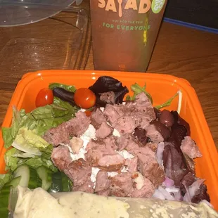 Greek Salad with creamy Greek dressing and steak with a green tea!