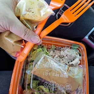 Items inside the bag. I ordered an extra Thai Peanut Dressing.