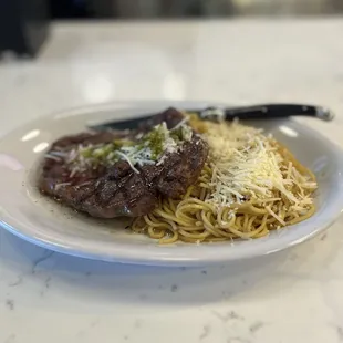 Steak with garlic noodles