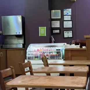 a restaurant with tables and chairs