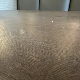 Tables wiped with a dirty rag.