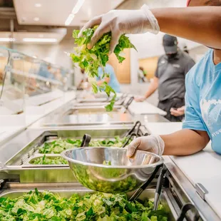 a person preparing food in a kitchen