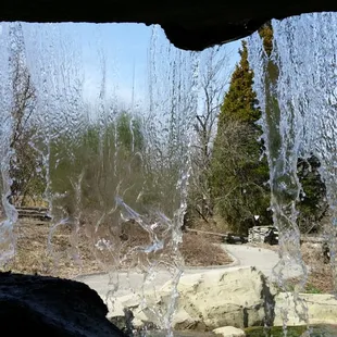 Behind waterfall