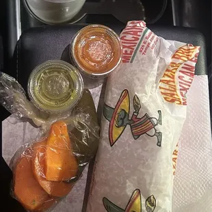 Green chili burrito, salsas, fresh carrot and jalapeño, piña drink