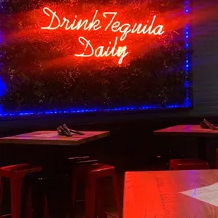a bar with red and blue lights