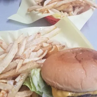pair of cheeseburgers and fries