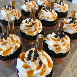 a tray of cupcakes