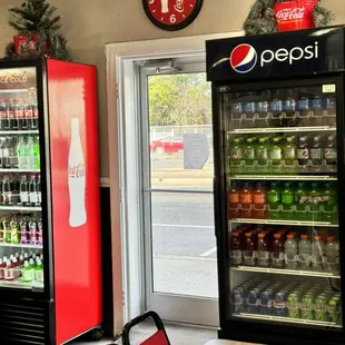 a coke cooler and a clock