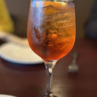 a drink in a wine glass