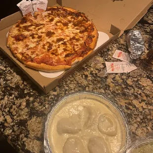 a pizza in a pizza box