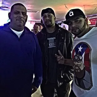 three men posing for a picture