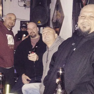 a group of men posing for a picture