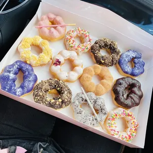 L to R: strawberry, B-day cake, chocolate crunch, Ube, lemon crunch, lychee rose, churro, chocolate and caramel, _,_, cookies&apos;n cream,_