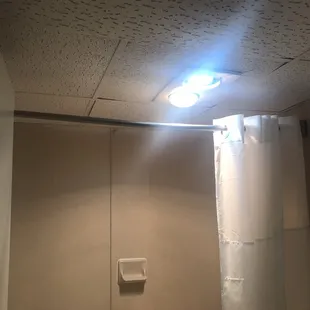 Bathroom light directly above the tub