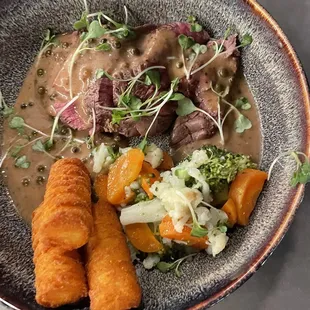 Filet with potato croquettes in an au poivre sauce
