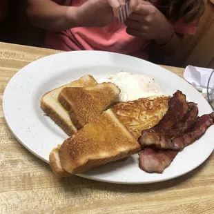 a plate of breakfast food