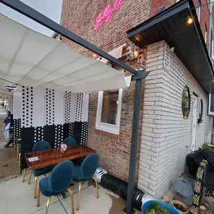 Cute covered outdoor dining it was raining and it didn't matter
