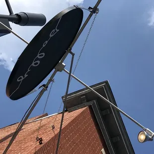 a street light and a sign on a pole