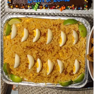 a tray of rice and eggs