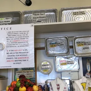 a notice sign on the counter