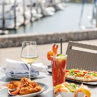 Dry Rubbed Chicken Wings, Shrimp Cocktail, and Smoked Salmon &amp; Fried Caper Flatbread paired with our Ultimate Bloody Mary - Lunch Menu