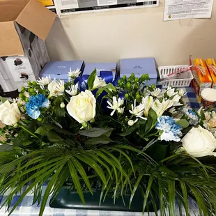 Requested minimalist blue and white casket spray