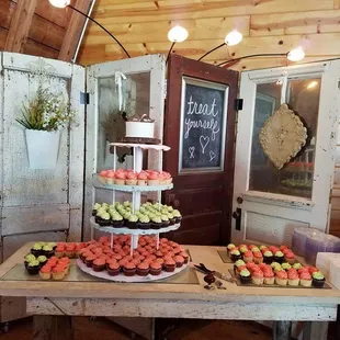 A photo of our cupcake set up! Awesome right?! Sally's delivered and set up the cupcakes too!