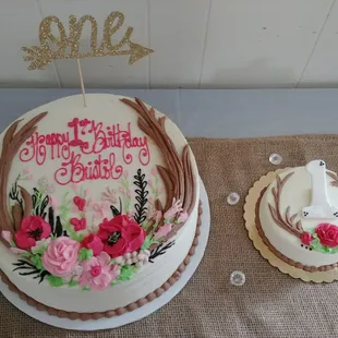 a birthday cake and cupcake