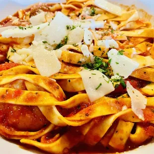 Shrimp &amp; Sausage Diavolo: tagliatelle, hot rope sausage, house sauce, fire roasted peppers.