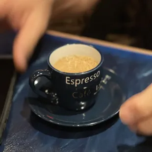 espresso coffee in a blue cup