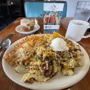 Ballard Industrial Scramble with a cinnamon roll substituted for the toast option and a cup of coffee.