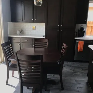 Nook table with hidden folding leaves.