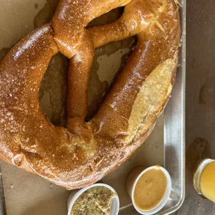 Pretzel with cheese and mustard