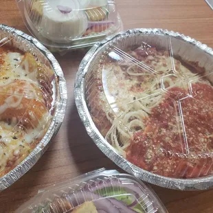 Eggplant Parmigiano on the right and Italian sampler on left