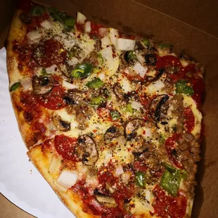 Deluxe pizza combo! 2 slices and a drink for $6 even