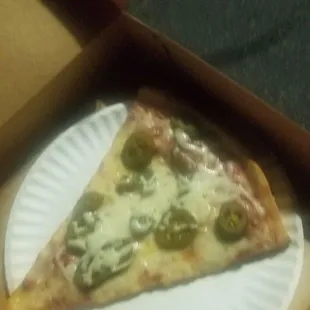 Old slice of pizza served with no jalapenos as asked, only brought out one, and they just put store bought cheese on it... No more