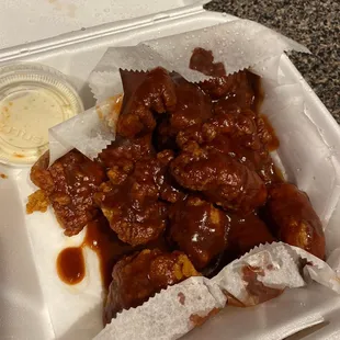 Orders bone-in received boneless with sauce just poured on top it's like the just put a whole bottle of sauce on there not edible