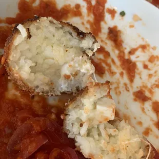 Can't see temperature, but you can tell the cheese isn't melted on the right one, it was also cold on the inside.