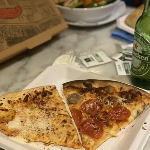 two slices of pizza on a plate