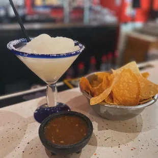 House blended margarita with their compliments chips and salsa. The tortilla chips are freshly made!