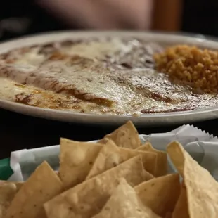 Enchiladas, rice, and beans