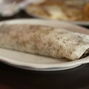 Carne Asada burrito. It doesn&apos;t look big in the picture, but I was only able to eat half of the burrito and that&apos;s very rare.